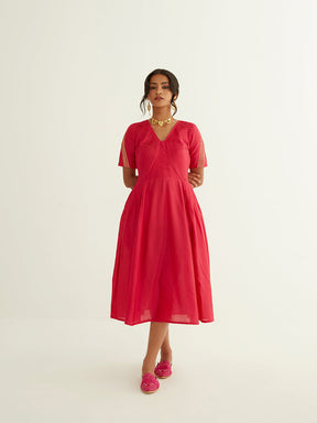 Pleated front dress with lace highlights on sleeves