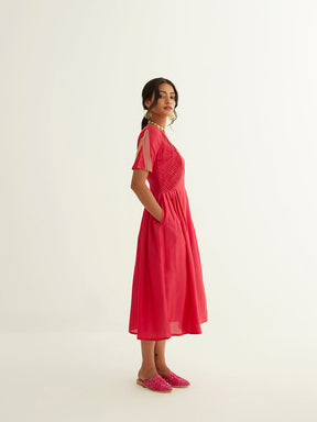 Pleated front dress with lace highlights on sleeves