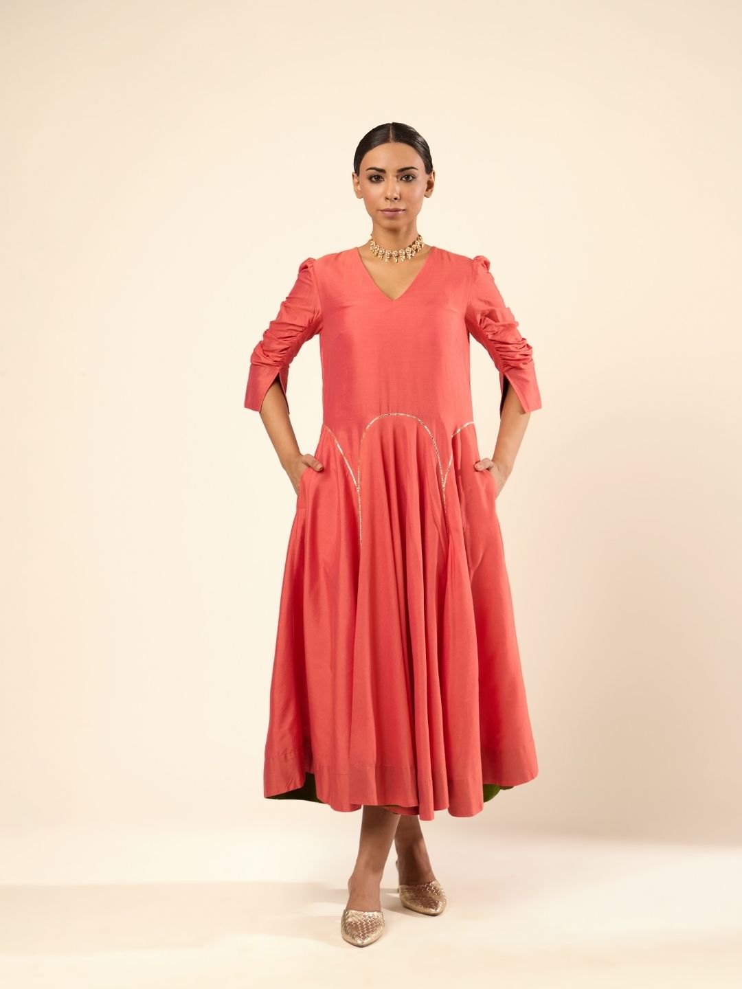 Circular panelled dress highlighted with Gota patti- Rust orange