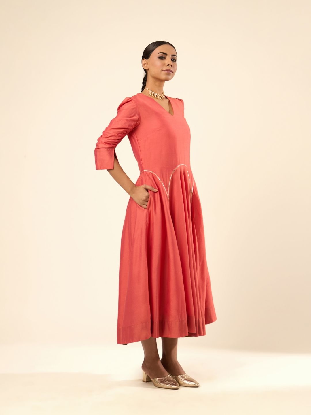 Circular panelled dress highlighted with Gota patti- Rust orange