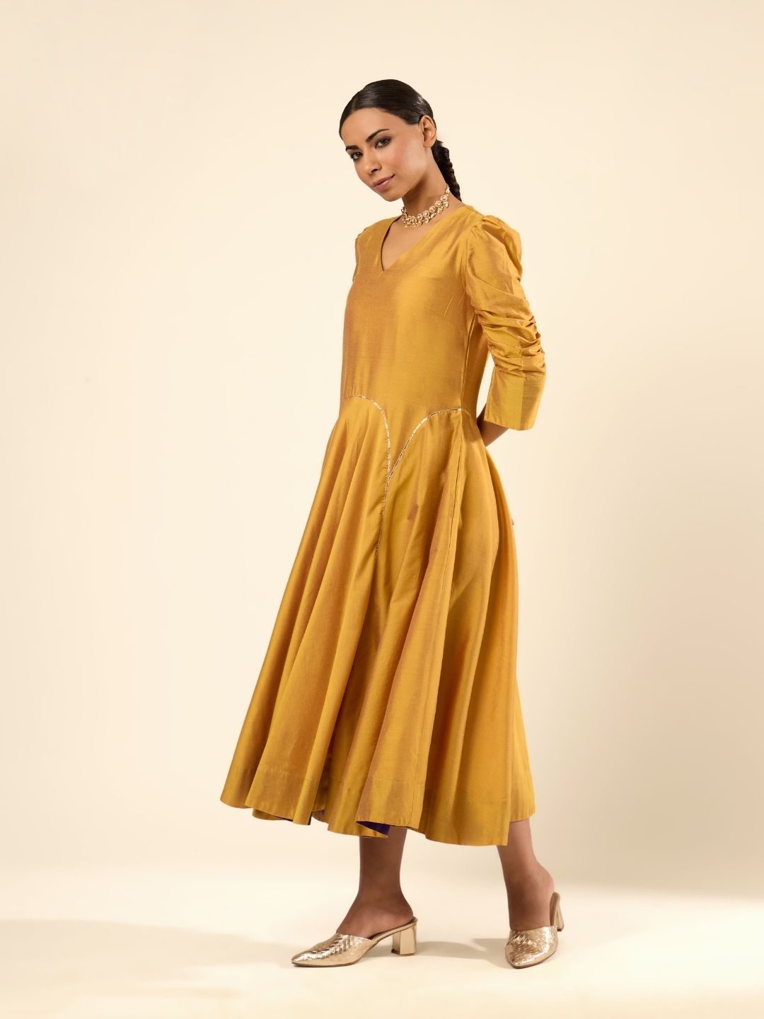 Circular panelled dress highlighted with Gota patti- Golden